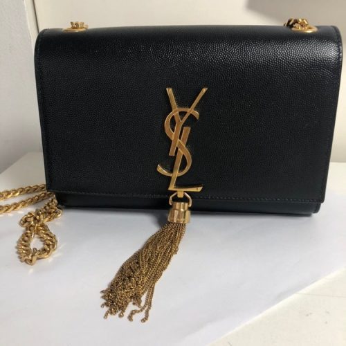 Yves Saint Laurent Black Clutch Bag With Gold Tassel Chain Strap Medium.